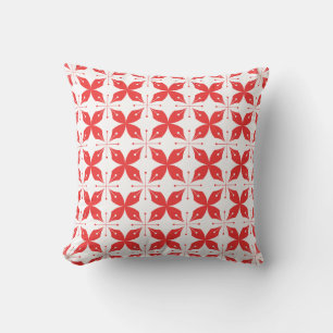 Rood en wit geometrisch patroon met gestileerde kussen