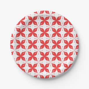 Rood en wit geometrisch patroon met gestileerde papieren bordje