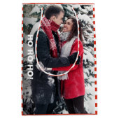 Rood en wit gestreept kerstfeest medium cadeauzakje (Voorkant)