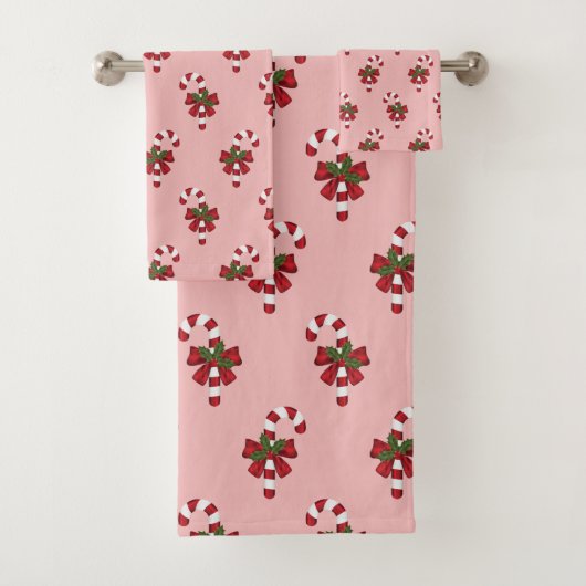 Rood en wit kerstsnoeppatroon op roze bad handdoek (Insitu)