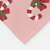 Rood en wit kerstsnoeppatroon op roze fleece deken (Hoek)