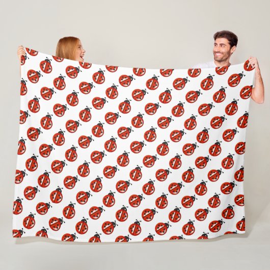 Rood en wit lieveheersbeestjes gooien deken (In situ)