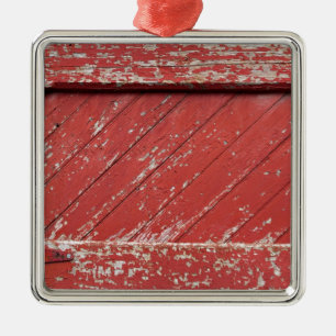 Rood gekleurde houten scheurdeur metalen ornament