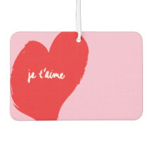 Rood hart met je t’aime-tekst op roze achtergrond