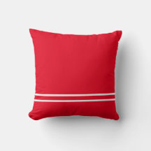 Rood kussen met witte lijnen