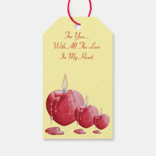 roodkaarsen met een liefdeshart branderig romantis cadeaulabel