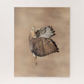 Roodstaarthaai tijdens de vlucht legpuzzel (Verticaal)