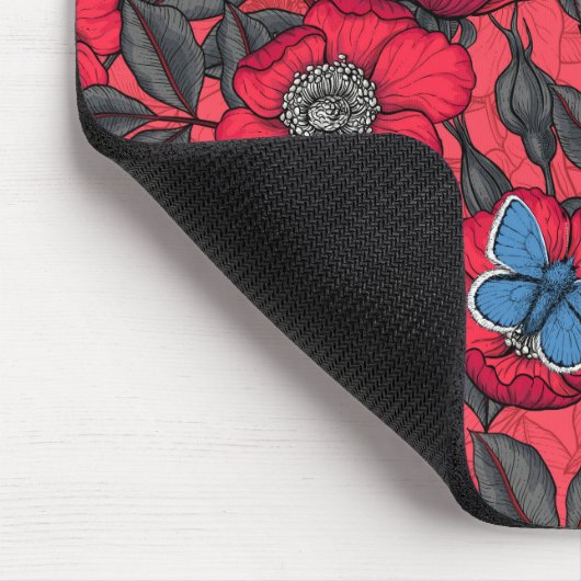 Roos en vlinders in rood en blauw muismat (Hoek)