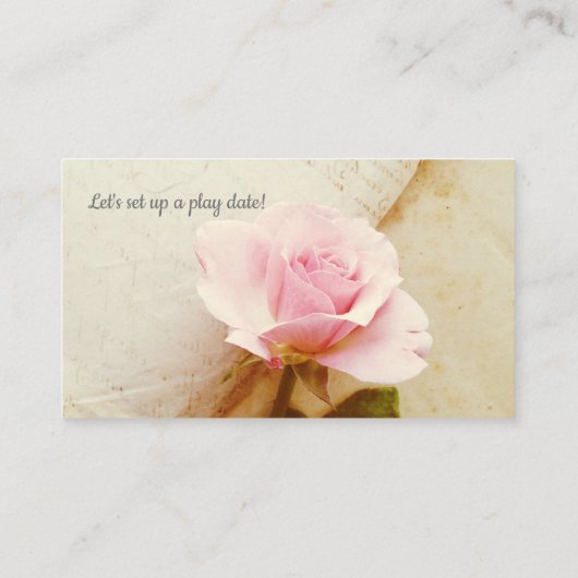 Roos op  boekpagina's visitekaartje (Achterkant)