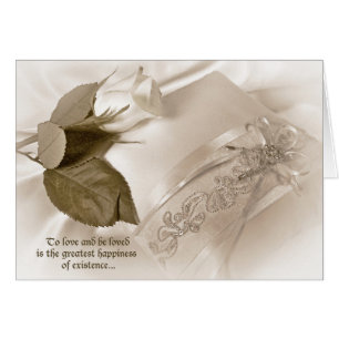 rose blanche sur coussin mariage