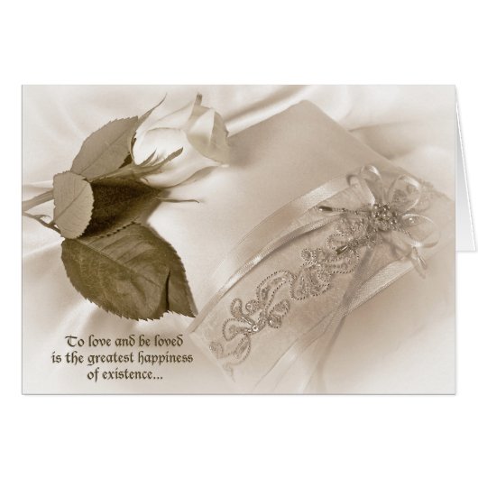 rose blanche sur coussin mariage (Devant horizontal)