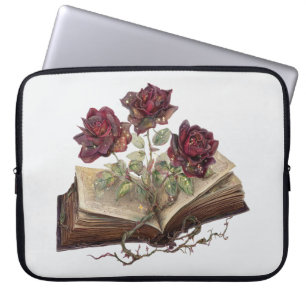 Roses rouges gothiques et sac d'ordinateur portabl