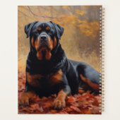 Rottweiler dans les feuilles d'automne automne aut (Dos)