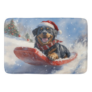 Rottweiler-hond in slee Laat het sneeuwen Kerstmis Badmat