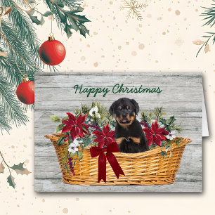 Rottweiler Puppy in mandje kerstkaart