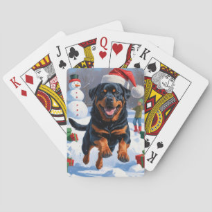 Rottweiler Rent in de Sneeuw met Kerstmuts Pokerkaarten