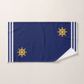 Roue de bateau dorée et rayures sur fond bleu mari (Serviette à main)