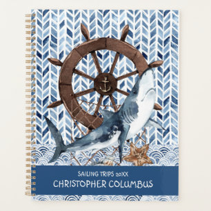 Roue de direction et requin du navire