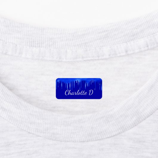 Royal blue-verfdruppelnaamscript labels (Aangebracht)