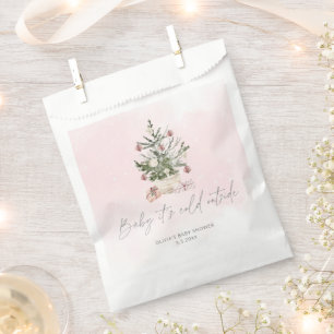 Roze baby met koude buitenkant neemt een speciale bedankzakje