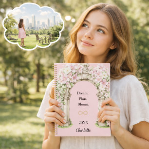 Roze bloemen boog inspirerend citaat 2027 planner