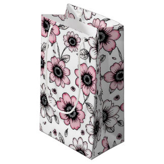 Roze bloemen en bladeren schetsontwerp klein cadeauzakje