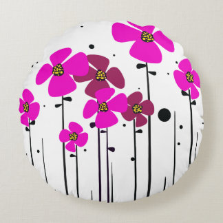 Roze bloemen rond kussen