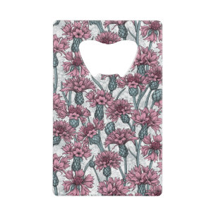 Roze bloemen, wilde bloemen op wit kredietkaart flessenopener