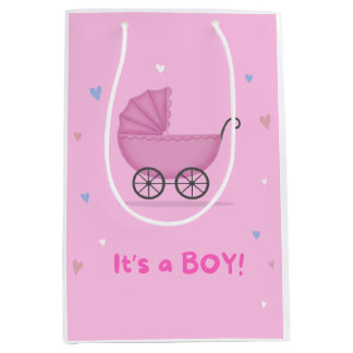 Roze cadeautas voor het verwelkomen van een babyjo