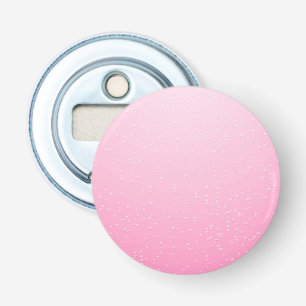 Roze champagne met kleine belletjes achtergrondkun button flesopener