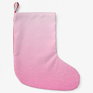 Roze champagne met kleine belletjes achtergrondkun kerstsok