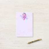 Roze droomvanger op Paarse Waterverf Post-it® Notes (Op bureau)