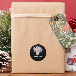 Roze en blauwe bloemen met zwarte achtergrond ronde sticker