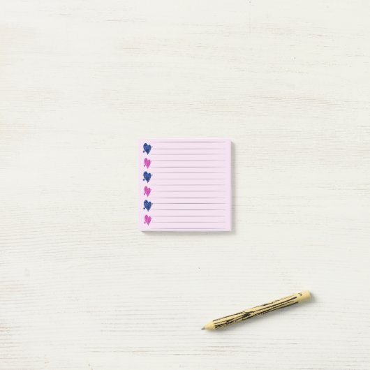 Roze en blauwe hartpost - it notities post-it® notes (Op bureau)