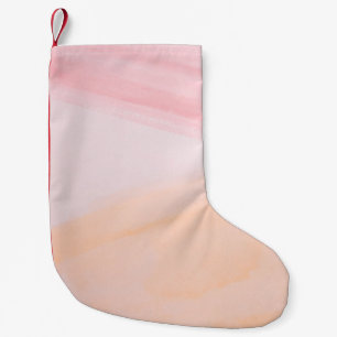 Roze en oranje verven kleine kerstsok