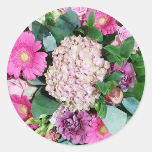 Roze en paarse bloemschikking ronde sticker
