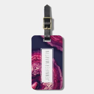  roze en Paarse geanode steen op blauw Bagagelabel