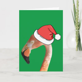 Roze flamingo met rode cartoon kerstman hoed feestdagen kaart