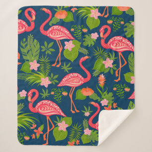 Roze flamingornament op een gestreepte turquoise sherpa deken