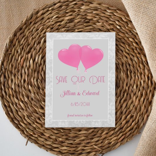 Roze hartballonnen bewaren de datum aankondiging