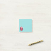 Roze huid met spin en geesten in ogen post-it® notes (Op bureau)
