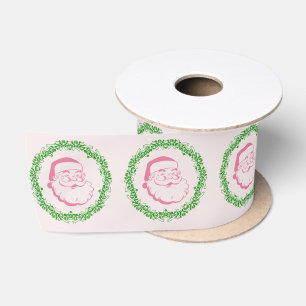 roze kerstman omlijst door een groene krans Xmas Lint