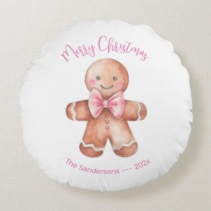 Roze kerstman van peperkoek rond kussen