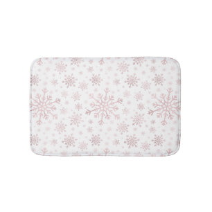 roze kerstsnowflakes op winterwit badmat