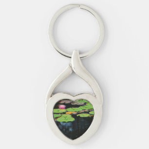 roze lotus zwart water sleutelhanger