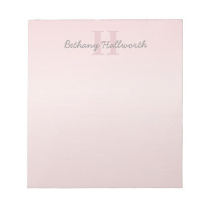 roze monogram en Jouw naam script bevestigen Notitieblok