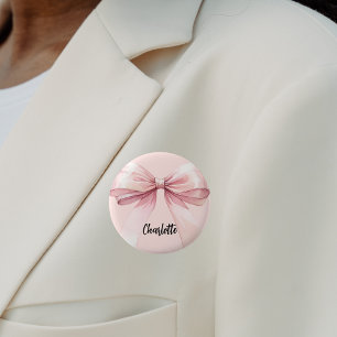 Roze naamkaartje met strik ronde button 5,7 cm
