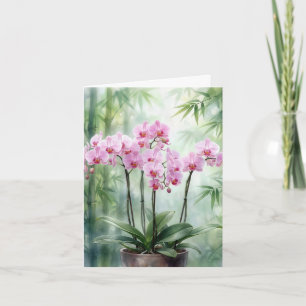 Roze orchideeën met bamboebomen feestdagen kaart