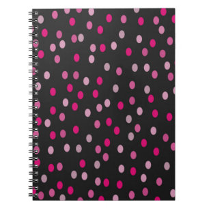 Roze pooldots op zwart notitieboek
