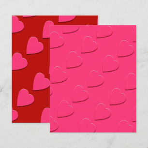 Roze reliëfharten in reliëfdruk op roze papier met